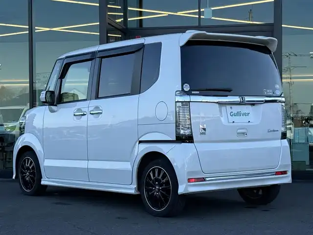 ホンダ Ｎ ＢＯＸ カスタム ターボ SSブラックSパッケージ 東京都 2016(平28)年 7万km プレミアムホワイトパールⅡ 純正ナビ/バックカメラ/ビルトインＥＴＣ/クルーズコントロール/両側電動スライドドア/ハーフレザーシート/シートヒーター/シティブレーキアクティブシステム/横滑り防止/プッシュスタート/パドルシフト/ＨＩＤヘッドライト/フォグランプ/純正フロアマット/純正１５インチＡＷ/ドアバイザー/スマートキー