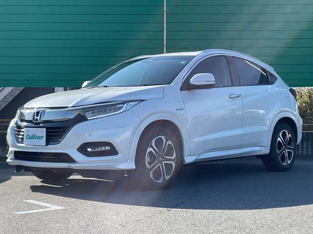 ホンダ ヴェゼル ハイブリッド Z ホンダセンシング 茨城県 2021(令3)年 1.6万km プラチナホワイトパール 社外9型ナビ/Bluetooth/フルセグTV/バックカメラ/HDMI/ビルトインETC/ドライブレコーダー/ハーフレザーシート/シートヒーター/レーダークルーズコントロール/衝突軽減システム/クリアランスソナー/横滑り防止装置/レーンキープアシスト/オートライト/LEDヘッドライト/コーナーセンサー/スマートキー