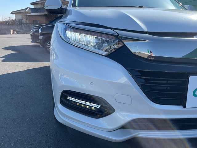 ホンダ ヴェゼル ハイブリッド Z ホンダセンシング 茨城県 2021(令3)年 1.6万km プラチナホワイトパール 社外9型ナビ/Bluetooth/フルセグTV/バックカメラ/HDMI/ビルトインETC/ドライブレコーダー/ハーフレザーシート/シートヒーター/レーダークルーズコントロール/衝突軽減システム/クリアランスソナー/横滑り防止装置/レーンキープアシスト/オートライト/LEDヘッドライト/コーナーセンサー/スマートキー