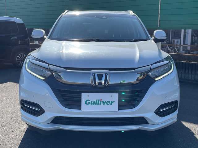 ホンダ ヴェゼル ハイブリッド Z ホンダセンシング 茨城県 2021(令3)年 1.6万km プラチナホワイトパール 社外9型ナビ/Bluetooth/フルセグTV/バックカメラ/HDMI/ビルトインETC/ドライブレコーダー/ハーフレザーシート/シートヒーター/レーダークルーズコントロール/衝突軽減システム/クリアランスソナー/横滑り防止装置/レーンキープアシスト/オートライト/LEDヘッドライト/コーナーセンサー/スマートキー