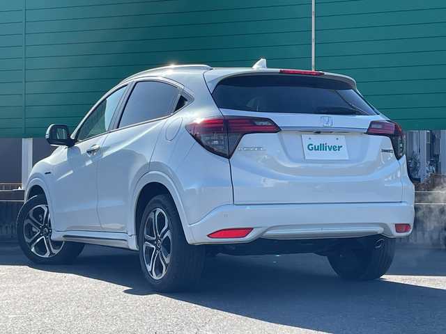 ホンダ ヴェゼル ハイブリッド Z ホンダセンシング 茨城県 2021(令3)年 1.6万km プラチナホワイトパール 社外9型ナビ/Bluetooth/フルセグTV/バックカメラ/HDMI/ビルトインETC/ドライブレコーダー/ハーフレザーシート/シートヒーター/レーダークルーズコントロール/衝突軽減システム/クリアランスソナー/横滑り防止装置/レーンキープアシスト/オートライト/LEDヘッドライト/コーナーセンサー/スマートキー