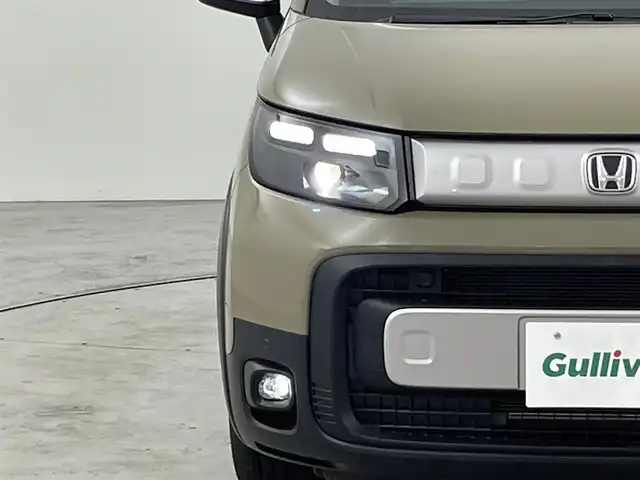 ホンダ フリード クロスター 福岡県 2025(令7)年 0.1万km未満 ベージュ 登録済未使用車　/純正ナビ（フルセグＴＶ）　/バックカメラ　/ＡＣＣ　/コーナーセンサー　/衝突被害軽減ブレーキ　/レーンキープ　/ＢＳＭ　/踏み間違い防止　/両側電動スライドドア　/ハーフレザー　/シートヒーター　/ＬＥＤ