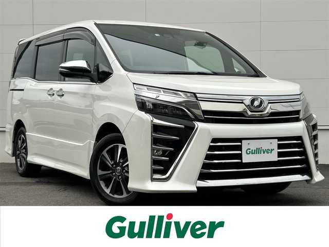 トヨタ ヴォクシー ZS 煌Ⅱ 秋田県 2020(令2)年 6.1万km ホワイトパールクリスタルシャイン トヨタセーフティセンス/・プリクラッシュセーフティ/・レーンディパーチャーアラート/・オートマチックハイビーム/クルーズコントロール/クリアランスソナー/純正10インチSDナビ/・バックカメラ/・フルセグTV/BT/CD/DVD/純正12.1インチフリップダウンモニター/純正16インチAW/両側パワースライドドア/LEDヘッドライト/オートライト/フォグランプ/ETC/前後ドライブレコーダー(SN-TW77)/プッシュスタート/ステアリングスイッチ/電動格納ミラー/ISOFIX/取扱説明書