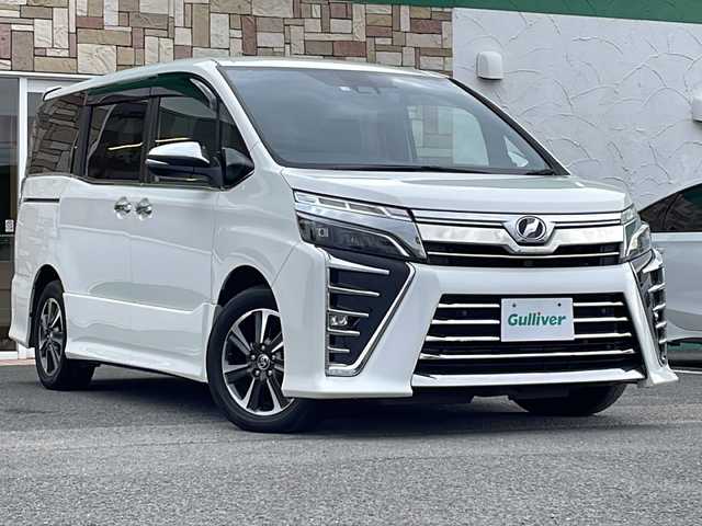 トヨタ ヴォクシー ZS 煌Ⅱ 徳島県 2020(令2)年 6.1万km ホワイトパールクリスタルシャイン トヨタセーフティセンス/・プリクラッシュセーフティ/・レーンディパーチャーアラート/・オートマチックハイビーム/クルーズコントロール/クリアランスソナー/純正10インチSDナビ/・バックカメラ/・フルセグTV/BT/CD/DVD/純正12.1インチフリップダウンモニター/純正16インチAW/両側パワースライドドア/LEDヘッドライト/オートライト/フォグランプ/ETC/前後ドライブレコーダー(SN-TW77)/プッシュスタート/ステアリングスイッチ/電動格納ミラー/ISOFIX/取扱説明書