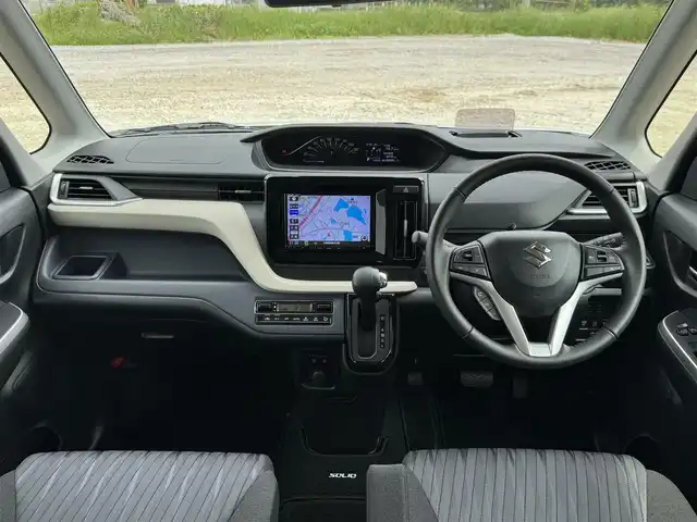 スズキ ソリオ HV MZ 兵庫県 2022(令4)年 1.1万km ピュアホワイトP 純正8インチナビ/全方位モニター/フルセグTV/Bluetooth接続可/DVD再生可/ナビ連動前後ドラレコ/レーダークルーズコントロール/ビルトインETC/両側パワースライドドア/純正15インチAW/LEDヘッドライト
