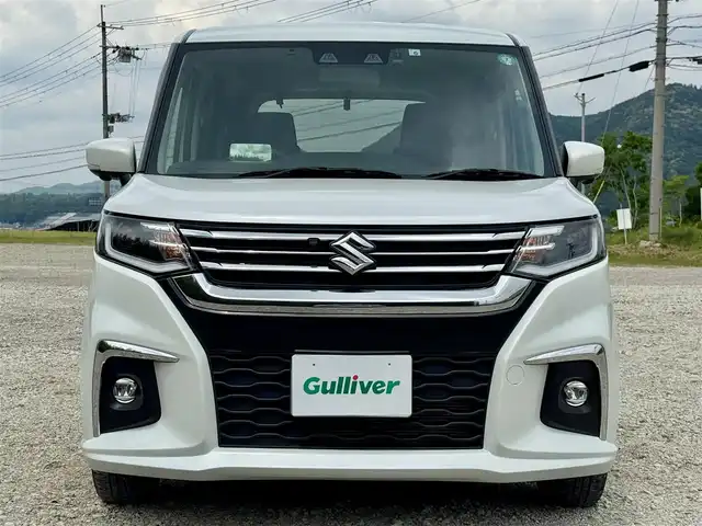 スズキ ソリオ HV MZ 兵庫県 2022(令4)年 1.1万km ピュアホワイトP 純正8インチナビ/全方位モニター/フルセグTV/Bluetooth接続可/DVD再生可/ナビ連動前後ドラレコ/レーダークルーズコントロール/ビルトインETC/両側パワースライドドア/純正15インチAW/LEDヘッドライト