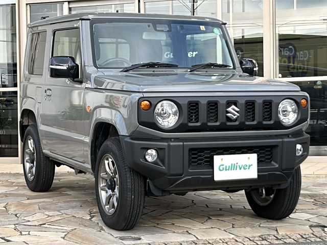 スズキ ジムニー XC 静岡県 2023(令5)年 0.5万km ミディアムグレー ワンオーナー/純正ナビ/・FM/AM/・SD/・フルセグTV/・USB/・Bluetooth/・MEMORY MUSIC/主要装備/・バックカメラ/・ＬＥＤヘッドランプ/・運転席助手席シートヒーター/・ドライブレコーダー/・サイドターンランプ付ドアミラー/・純正１６インチＡＷ/・ワンオーナー/・アイドリングストップ/・衝突被害軽減システム/(デュアルセンサーブレーキサポート)/・サイドカーテンエアバッグ/・2H-4H-4L切替