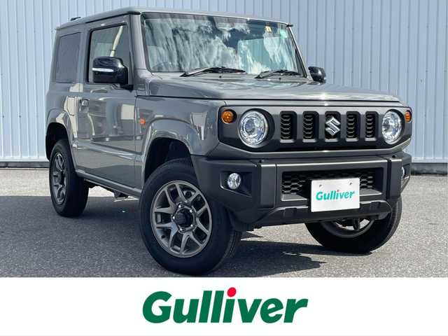 スズキ ジムニー XC 滋賀県 2023(令5)年 0.5万km ミディアムグレー ワンオーナー/純正ナビ/・FM/AM/・SD/・フルセグTV/・USB/・Bluetooth/・MEMORY MUSIC/主要装備/・バックカメラ/・ＬＥＤヘッドランプ/・運転席助手席シートヒーター/・ドライブレコーダー/・サイドターンランプ付ドアミラー/・純正１６インチＡＷ/・ワンオーナー/・アイドリングストップ/・衝突被害軽減システム/(デュアルセンサーブレーキサポート)/・サイドカーテンエアバッグ/・2H-4H-4L切替