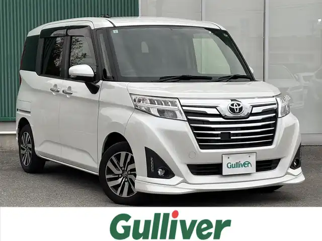 トヨタ ルーミー カスタムG 福岡県 2017(平29)年 12.8万km パールホワイトⅢ ALPINE9型ナビ（BT/フルセグ/DISC/AM/FM/SD）/フロントエアロ/両側パワースライドドア/純正LEDヘッドライト/オートライト/シートカバー/ウォークスルー/純正14インチAW/サンシェード/横滑り防止装置/盗難防止装置/アイドリングストップ/スマートキー/ETC