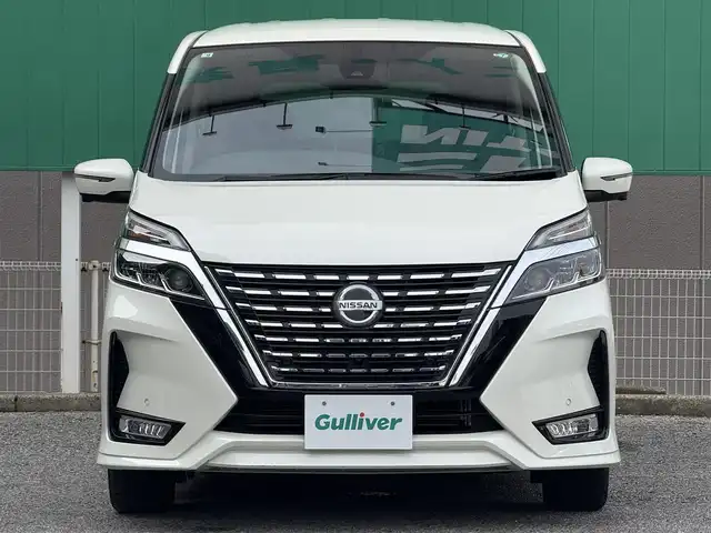 日産 セレナ ハイウェイスター V 千葉県 2021(令3)年 2.9万km ブリリアントホワイトパール 純正SDナビ（AM/FM/CD/DVD/Bluetooth）/フルセグTV/フリップダウンモニター/両側パワースライドドア/クルーズコントロール/社外カメラ（バック/フロント/サイド/全方位）/プロパイロット/横滑り防止/レーンキープアシスト/エマージェンシーブレーキ/インテリジェントルームミラー/パーソナルテーブル/純正アルミホイール/スマートキー