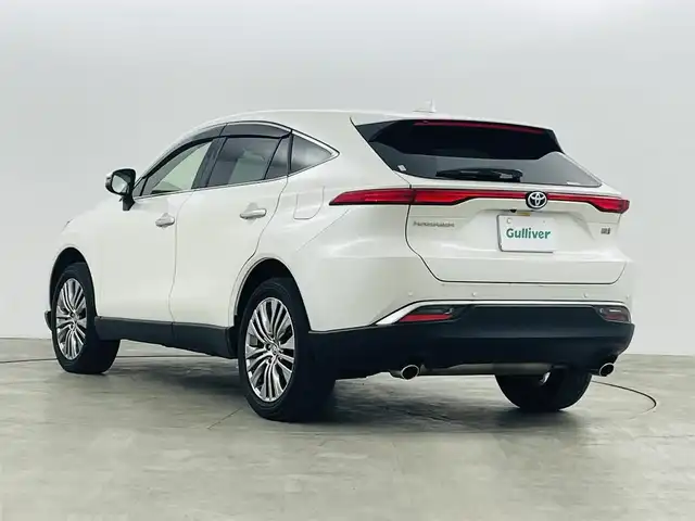 トヨタ ハリアー ハイブリッド Z レザーパッケージ 福島県 2021(令3)年 6.8万km ホワイトパールクリスタルシャイン トヨタセーフティーセンス/・衝突軽減ブレーキ/・レーンディパーチャーアラート/・レーントレーシングアシスト/・レーダークルーズコントロール/・リアクロストラフィックアラート/・道路標識認識/・発進遅れ告知機能/・クリアランスソナー/・アダプティブハイビームシステム/ＪＢＬプレミアムサウンド/ワンオーナー/純正１２．３型ディスプレイオーディオ/・フルセグTV/・ビルトインETC2.0/・全方位カメラ/・AM、FM/・Bluetooth/・USB/・AUX/・Miracast/ヘッドアップディスプレイ/ブラインドスポットモニター/デジタルインナーミラー（ドラレコ付き）/前後ドライブレコーダー/パワーバックドア/AC100V/LEDヘッドライト/・フォグランプ/・オートライト/レザーシート/・エアシート/・シートヒーター/・ハンドルヒーター/純正ホイール/純正フロアマット/ドアバイザー/スマートキー/・プッシュスタート/・スペアキー