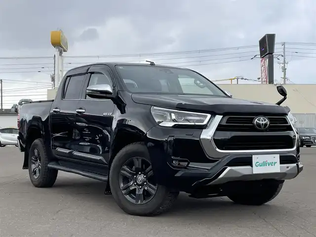 トヨタ ハイラックス Z 道東・釧路十勝 2021(令3)年 3.4万km アティチュードブラックマイカ ４WD/寒冷地仕様/運転支援装置/・PCS(プリクラッシュセーフティ)/・LDA(レーンディパーチャーアラート)/・RSA(ロードサインアシスト)/・レーダークルーズコントロール/・先行車発進告知/GRパーツ装着/ (フロントバンパーカバー/サイドステップ)/純正ディーラーOPナビ/ (CD/DVD/BT)/フルセグTV/バックカメラ/ETC/革巻きステアリング/ステアリングスイッチ/プッシュスタート/スマートキー/スペアキー/純正エンジンスターター/純正17インチAW/オートライト/純正LEDヘッドライト/フォグランプ/ (フロント/リア)/ウインカーミラー/電動格納ミラー/ミラーヒーター/純正ドアバイザー/社外フロアマット/アイドリングストップ/横滑り防止装置/ナビ取扱説明書/取扱説明書/保証書