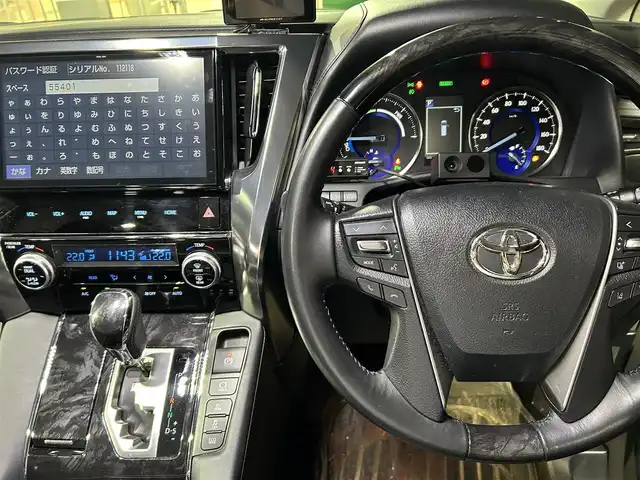 トヨタ ヴェルファイア ハイブリット ZR 東京都 2019(平31)年 4.2万km ホワイトパールクリスタルシャイン 純正ナビ/(NSZN-Z68T)/(CD/DVD/フルセグ/Bluetooth/HDMI)/バックカメラ/コーナーセンサー/レザーシート/前席シートヒーター/前席シートクーラー/前席パワーシート/運転席メモリーシート/助手席+2列目席オットマン/電動パーキング/LDW/プリクラッシュセーフティ/PKSB/レーダークルーズコントロール/スマートキー/パワードサブウーファー/(carroozzeria)/pivot/(3-drivePRO)/スペアキー×1/プッシュスタート/オートライト/三眼LEDライト/オートハイビーム/フロントフォグランプ/ETC/純正フロアマット/ISOFIX/ドラレコ/革巻きステアリング/ステアリングスイッチ/プライバシーガラス/ドアバイザー/電動格納ウィンカーミラー/社外17インチアルミホイール/W+カーテンSRS+ABS/横滑り防止装置/取扱説明書