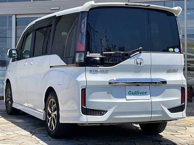 ホンダ ステップワゴン スパーダ ホンダセンシング 静岡県 2020(令2)年 5.1万km プラチナホワイトパール 【安全装備】/ホンダセンシング/アダプティブ・クルーズ・コントロール（ACC）/・作動車速域：約30km/hから100km/h間/車線維持支援システム（LKAS）/・作動車速：約65km/hから100km/h間/・ステアリング制御/衝突軽減ブレーキ（CMBS）/・歩行者検知機能/・作動車速：約80km/h未満時/・対向車車速：約30km/hから80km/h時/誤発進抑制機能（前進）/・ミリ波レーダー検知：作動車速10km/h未満/歩行者事故低減ステアリング/・作動車速10km/hから40km/h間/路外逸脱抑制機能/・作動車速：約60km/hから100km/h間/先行車発進お知らせ機能/標識認識機能/【主要装備】/10インチ純正ナビ　/純正１６インチアルミホイール　/両側パワースライドドア　/バックカメラ　/11.6インチ後席フリップダウンモニター　/わくわくゲート　/LEDヘッドライト/LEDフォグ/スマートキー/プッシュスタート/スペアキー有り
