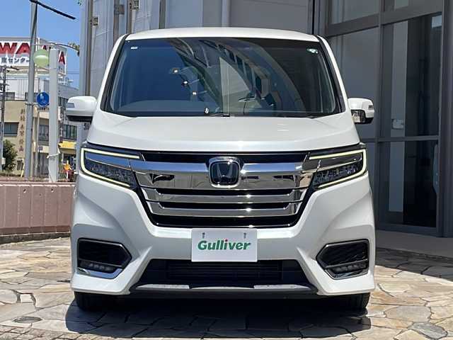 ホンダ ステップワゴン スパーダ ホンダセンシング 静岡県 2020(令2)年 5.1万km プラチナホワイトパール 【安全装備】/ホンダセンシング/アダプティブ・クルーズ・コントロール（ACC）/・作動車速域：約30km/hから100km/h間/車線維持支援システム（LKAS）/・作動車速：約65km/hから100km/h間/・ステアリング制御/衝突軽減ブレーキ（CMBS）/・歩行者検知機能/・作動車速：約80km/h未満時/・対向車車速：約30km/hから80km/h時/誤発進抑制機能（前進）/・ミリ波レーダー検知：作動車速10km/h未満/歩行者事故低減ステアリング/・作動車速10km/hから40km/h間/路外逸脱抑制機能/・作動車速：約60km/hから100km/h間/先行車発進お知らせ機能/標識認識機能/【主要装備】/10インチ純正ナビ　/純正１６インチアルミホイール　/両側パワースライドドア　/バックカメラ　/11.6インチ後席フリップダウンモニター　/わくわくゲート　/LEDヘッドライト/LEDフォグ/スマートキー/プッシュスタート/スペアキー有り