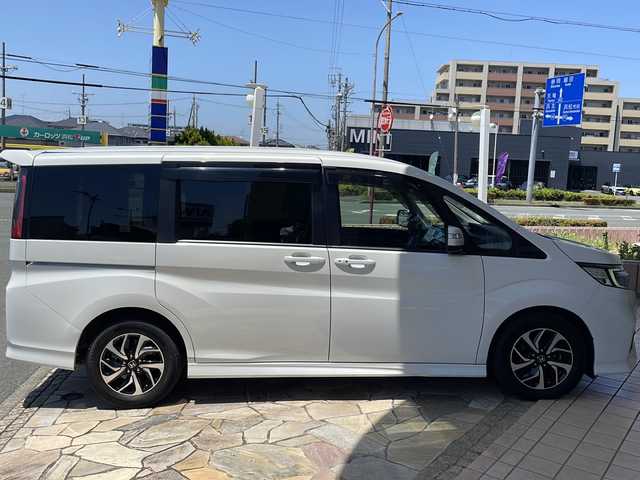 ホンダ ステップワゴン スパーダ ホンダセンシング 静岡県 2020(令2)年 5.1万km プラチナホワイトパール 【安全装備】/ホンダセンシング/アダプティブ・クルーズ・コントロール（ACC）/・作動車速域：約30km/hから100km/h間/車線維持支援システム（LKAS）/・作動車速：約65km/hから100km/h間/・ステアリング制御/衝突軽減ブレーキ（CMBS）/・歩行者検知機能/・作動車速：約80km/h未満時/・対向車車速：約30km/hから80km/h時/誤発進抑制機能（前進）/・ミリ波レーダー検知：作動車速10km/h未満/歩行者事故低減ステアリング/・作動車速10km/hから40km/h間/路外逸脱抑制機能/・作動車速：約60km/hから100km/h間/先行車発進お知らせ機能/標識認識機能/【主要装備】/10インチ純正ナビ　/純正１６インチアルミホイール　/両側パワースライドドア　/バックカメラ　/11.6インチ後席フリップダウンモニター　/わくわくゲート　/LEDヘッドライト/LEDフォグ/スマートキー/プッシュスタート/スペアキー有り