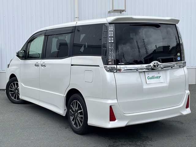 トヨタ ヴォクシー ZS 煌Ⅱ 三重県 2017(平29)年 4.6万km ホワイトパールクリスタルシャイン 純正9型ナビ(AM/FM/CD/TV/BT)/フルセグTV/バックカメラ/ビルトインETC/前方ドライブレコーダー/両側パワースライドドア/スペアキー/リヤサンシェード/衝突軽減ブレーキ/レーンキープアシスト/オートハイビーム/革巻きステアリング/横滑り防止/アイドリングストップ/電動格納ミラー/禁煙車