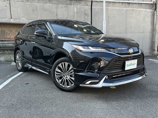 トヨタ ハリアー ハイブリッド Z レザーパッケージ 愛知県 2025(令7)年 0.4万km プレシャスブラックパール メーカーオプションナビ/JBLサウンド/モデリスタエアロ（F/S/R）/録画機能付きデジタルインナーミラー/ToyotaSafetySense/・プリクラッシュセーフティ/・レーントレーシングアシスト/・レーダークルーズコントロール/・ロードサインアシスト/クリアランスソナー/パノラミックビューモニター/パワーバックドア/HUD/ビルトインETC2.0/ブラインドスポットモニター/レザーシート/前席パワーシート（運転席メモリ機能付き）/シートヒーター/エアシート/ステアリングヒーター/LEDヘッドライト/オートライト/オートハイビーム/フォグランプ/スマートキー/プッシュスタート/パーキングサポートブレーキ/EVモード・ecoモード・スポーツモード/ISOFIX/保証書/取扱説明書