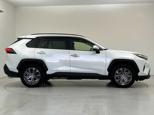トヨタ ＲＡＶ４ ハイブリッドG 愛知県 2024(令6)年 1万km プラチナホワイトパールマイカ パノラマサンルーフ/Toyota Safety Sense/・プリクラッシュセーフティ/・レーントレーシングアシスト/・レーダークルーズコントロール/・オートハイビーム/・ロードサインアシスト/純正10.5インチナビ/・AppleCarPlay/・Android Auto/・フルセグTV/・Miracast/・USB/・AM/FM/パノラミックビューモニター/デジタルインナーミラー/黒革シート/先行車発進のお知らせ/パーキングサポートブレーキ/ブラインドスポットアシスト/シートヒーター/シートベンチレーション/パワーバックドア/LEDヘッドライト/ETC/ステアリングヒーター/スマートキー/プッシュスタート/横滑り防止装置