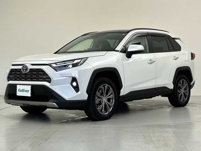 トヨタ ＲＡＶ４ ハイブリッドG 愛知県 2024(令6)年 1万km プラチナホワイトパールマイカ パノラマサンルーフ/Toyota Safety Sense/・プリクラッシュセーフティ/・レーントレーシングアシスト/・レーダークルーズコントロール/・オートハイビーム/・ロードサインアシスト/純正10.5インチナビ/・AppleCarPlay/・Android Auto/・フルセグTV/・Miracast/・USB/・AM/FM/パノラミックビューモニター/デジタルインナーミラー/黒革シート/先行車発進のお知らせ/パーキングサポートブレーキ/ブラインドスポットアシスト/シートヒーター/シートベンチレーション/パワーバックドア/LEDヘッドライト/ETC/ステアリングヒーター/スマートキー/プッシュスタート/横滑り防止装置
