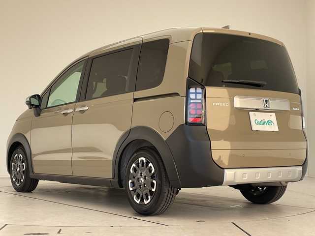 ホンダ フリード ハイブリット e:HEV クロスター 愛知県 2025(令7)年 0.1千km 茶Ｍ 登録済未使用車/純正9型ディスプレイオーディオナビ/両側パワースライドドア/レーダークルーズコントロール/シートヒーター/バックカメラ/コーナーセンサー/ブラインドスポットモニター/LEDヘッドライト/オートマチックハイビーム/衝突軽減システム/フルセグ/Bluetooth/ステアリングスイッチ/スマートキー/プッシュスタート