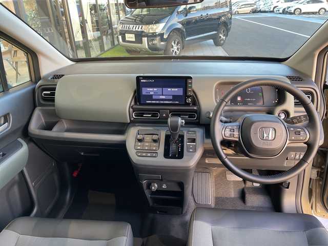 ホンダ フリード ハイブリット e:HEV クロスター 愛知県 2025(令7)年 0.1千km 茶Ｍ 登録済未使用車/純正9型ディスプレイオーディオナビ/両側パワースライドドア/レーダークルーズコントロール/シートヒーター/バックカメラ/コーナーセンサー/ブラインドスポットモニター/LEDヘッドライト/オートマチックハイビーム/衝突軽減システム/フルセグ/Bluetooth/ステアリングスイッチ/スマートキー/プッシュスタート