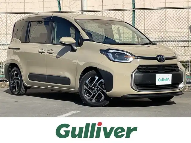 トヨタ シエンタ Z 東京都 2024(令6)年 0.7万km ベージュ 純正ナビ/バックカメラ/Bluetooth/フルセグTV/両側電動スライドドア/ETC2.0/前後ドライブレコーダー/レーダークルーズコントロール/前後コーナーセンサー/ブラインドスポットモニター/衝突軽減装置/車線逸脱警報装置/横滑り防止装置/スマートキー/純正サイドバイザー/純正15インチAWホイール