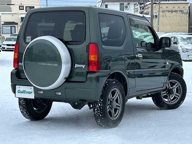 スズキ ジムニー ランドベンチャー 道北・旭川 2015(平27)年 5.2万km クールカーキPM /4WD//社外ナビ/CD/DVD/BT/フルセグ/USB/SD/MSV//シートヒーター//ミラーヒーター//ETC//革巻きステアリング//純正16インチアルミホイール//背面タイヤハードカバー//ハーフレザーシート//スペアキー//フォグランプ//純正フロアマット//ドアバイザー//保証書//取扱説明書