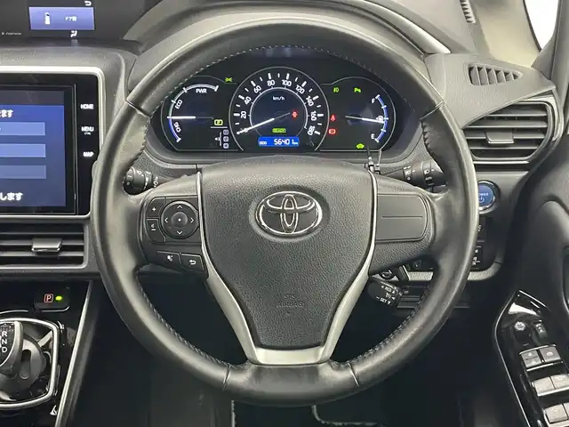 トヨタ ヴォクシー ハイブリッド ZS 煌Ⅲ 愛知県 2021(令3)年 5.7万km ホワイトパールクリスタルシャイン 純正１０型ナビ　フルセグＴＶ　純正１２．１型後席モニター　ハーフレザー　シートヒーター　バックカメラ　ＥＴＣ２．０　前後ドラレコ　衝突軽減　クルコン　ＬＥＤオートライト　コーナーセンサ　フォグランプ　レザー調シートカバー　トヨタセーフティセンス　禁煙車