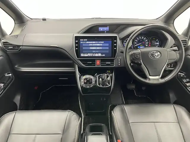 トヨタ ヴォクシー ハイブリッド ZS 煌Ⅲ 愛知県 2021(令3)年 5.7万km ホワイトパールクリスタルシャイン 純正１０型ナビ　フルセグＴＶ　純正１２．１型後席モニター　ハーフレザー　シートヒーター　バックカメラ　ＥＴＣ２．０　前後ドラレコ　衝突軽減　クルコン　ＬＥＤオートライト　コーナーセンサ　フォグランプ　レザー調シートカバー　トヨタセーフティセンス　禁煙車