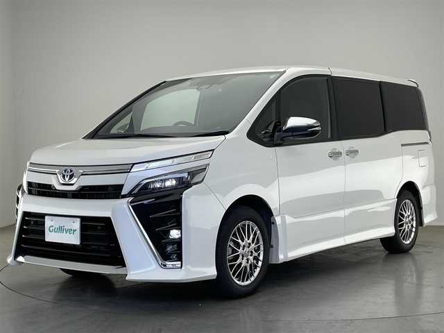 トヨタ ヴォクシー ハイブリッド ZS 煌Ⅲ 愛知県 2021(令3)年 5.7万km ホワイトパールクリスタルシャイン 純正１０型ナビ　フルセグＴＶ　純正１２．１型後席モニター　ハーフレザー　シートヒーター　バックカメラ　ＥＴＣ２．０　前後ドラレコ　衝突軽減　クルコン　ＬＥＤオートライト　コーナーセンサ　フォグランプ　レザー調シートカバー　トヨタセーフティセンス　禁煙車