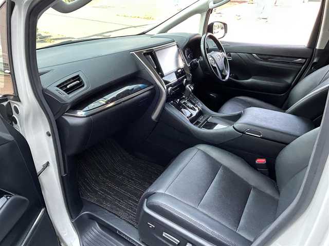トヨタ ヴェルファイア ハイブリット ZR 道央・札幌 2018(平30)年 8.5万km ホワイトパールクリスタルシャイン 登録時走行距離　84163km/　4　W　D　/７人乗り/ワンオーナー/寒冷地仕様/フルモデリスタエアロ/WORK20インチAW装着/Toyota Safety Sense/・プリクラッシュセーフティ/・レーンディバーチャーアラート/・クリアランスソナー/・オートマチックハイビーム/・レーダークルーズコントロール/純正ディーラーOPナビ/(AM/FM/CD/DVD/HDMI/BT/SD)/フルセグTV/バックカメラ/純正フリップダウンモニター/両側パワースライドドア/パワーバックドア/デジタルインナーミラー/ビルトインETC/純正前方ドライブレコーダー/スマートキー１体型エンジンスターター/黒革シート/シートヒーター/エアシート/前席パワーシート/助手席オットマンシート/運転席シートメモリ/フロントワイパーデアイサー/三眼LEDヘッドライト/シーケンシャルウィンカー/ウッドコンビ革巻ステアリング/AC100V/SUNTREXヒッチメンバー/純正AW付冬タイヤ積み込み/取説/保証書
