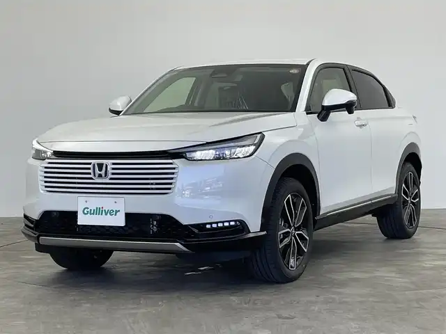 ホンダ ヴェゼル ハイブリッド e:HEV Z 群馬県 2025(令7)年 0.1千km プラチナホワイトパール e:HEV Z　3VC4AG3　Honda CONNECTディスプレー+ETC2.0車載器+ワイヤレス充電器(220/000)/登録済未使用車　純正９インチナビ　アダプティブクルーズコントロール　レーンアシスト　ビルトインＥＴＣ２．０　ワイアレス充電　ＢＳＭ　パワーバックドア　障害物センサー　オートマチックハイビーム　禁煙車