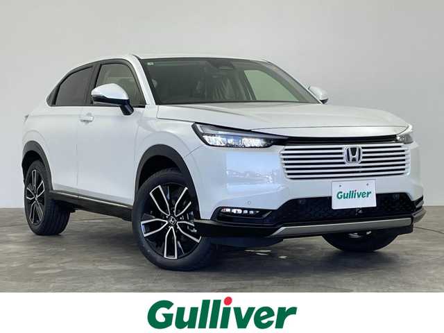 ホンダ ヴェゼル ハイブリッド e:HEV Z 群馬県 2025(令7)年 0.1千km プラチナホワイトパール e:HEV Z　3VC4AG3　Honda CONNECTディスプレー+ETC2.0車載器+ワイヤレス充電器(220/000)/登録済未使用車　純正９インチナビ　アダプティブクルーズコントロール　レーンアシスト　ビルトインＥＴＣ２．０　ワイアレス充電　ＢＳＭ　パワーバックドア　障害物センサー　オートマチックハイビーム　禁煙車