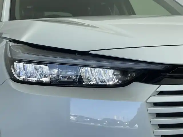 ホンダ ヴェゼル ハイブリッド e:HEV Z 群馬県 2025(令7)年 0.1千km プラチナホワイトパール e:HEV Z　3VC4AG3　Honda CONNECTディスプレー+ETC2.0車載器+ワイヤレス充電器(220/000)/登録済未使用車　純正９インチナビ　アダプティブクルーズコントロール　レーンアシスト　ビルトインＥＴＣ２．０　ワイアレス充電　ＢＳＭ　パワーバックドア　障害物センサー　オートマチックハイビーム　禁煙車