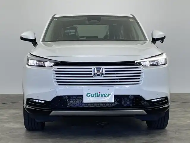 ホンダ ヴェゼル ハイブリッド e:HEV Z 群馬県 2025(令7)年 0.1千km プラチナホワイトパール e:HEV Z　3VC4AG3　Honda CONNECTディスプレー+ETC2.0車載器+ワイヤレス充電器(220/000)/登録済未使用車　純正９インチナビ　アダプティブクルーズコントロール　レーンアシスト　ビルトインＥＴＣ２．０　ワイアレス充電　ＢＳＭ　パワーバックドア　障害物センサー　オートマチックハイビーム　禁煙車