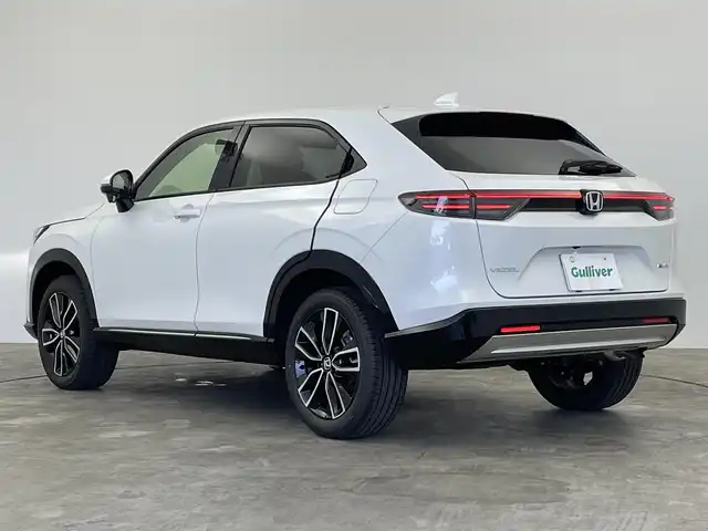 ホンダ ヴェゼル ハイブリッド e:HEV Z 群馬県 2025(令7)年 0.1千km プラチナホワイトパール e:HEV Z　3VC4AG3　Honda CONNECTディスプレー+ETC2.0車載器+ワイヤレス充電器(220/000)/登録済未使用車　純正９インチナビ　アダプティブクルーズコントロール　レーンアシスト　ビルトインＥＴＣ２．０　ワイアレス充電　ＢＳＭ　パワーバックドア　障害物センサー　オートマチックハイビーム　禁煙車