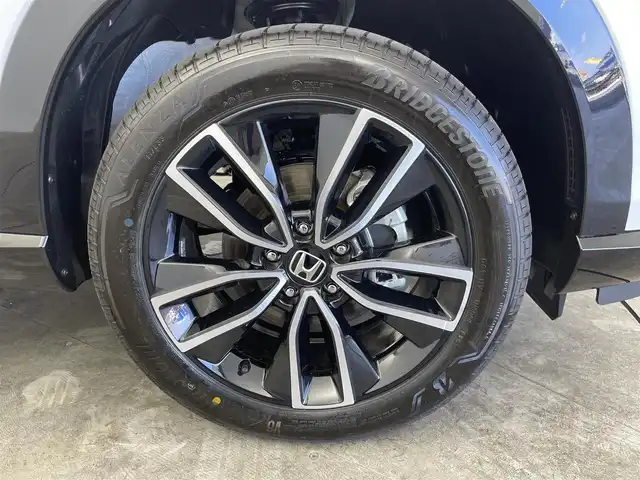 ホンダ ヴェゼル ハイブリッド e:HEV Z 群馬県 2025(令7)年 0.1千km プラチナホワイトパール e:HEV Z　3VC4AG3　Honda CONNECTディスプレー+ETC2.0車載器+ワイヤレス充電器(220/000)/登録済未使用車　純正９インチナビ　アダプティブクルーズコントロール　レーンアシスト　ビルトインＥＴＣ２．０　ワイアレス充電　ＢＳＭ　パワーバックドア　障害物センサー　オートマチックハイビーム　禁煙車