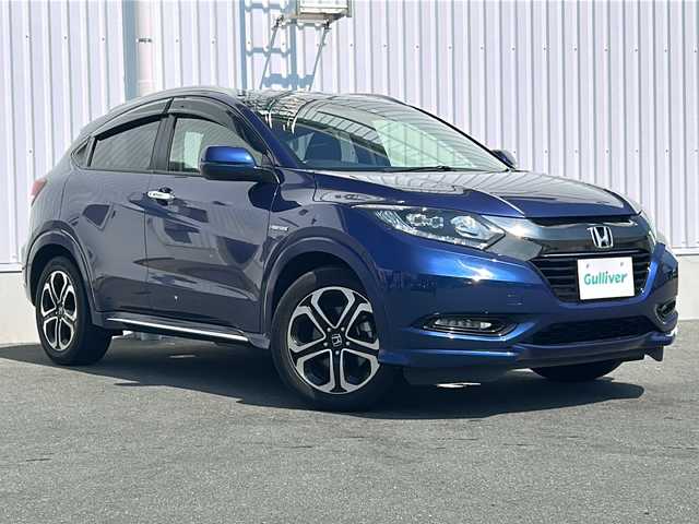 ホンダ ヴェゼル ハイブリッド Z ホンダセンシング 三重県 2017(平29)年 2.9万km モルフォブルーP 純正ナビ/バックカメラ/前席シートヒーター/クルーズコントロール/ＬＥＤヘッドライト/前後ドライブレコーダー/スペアキー/ハーフレザー/純正フロアマット/ＵＳＢ給電/革巻きハンドル/電動格納ミラー/禁煙