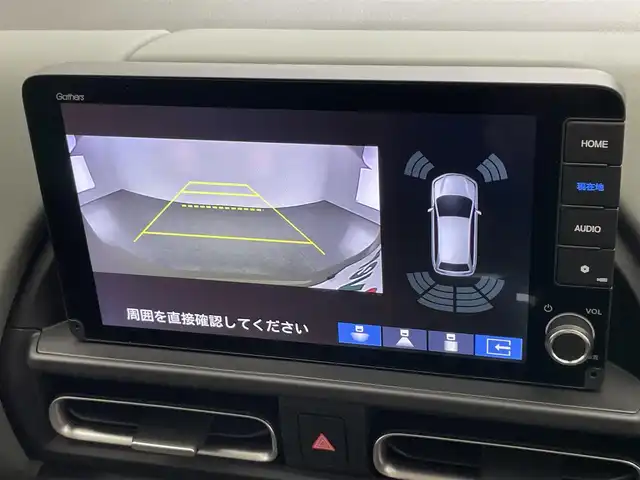 ホンダ フリード ハイブリット e:HEV クロスター 愛知県 2025(令7)年 0.1千km ベージュ 登録済未使用車　純正９型ナビ　禁煙　シートヒーター　ハーフレザー　電動パーキング　ホンダセンシング　衝突軽減　追従クルコン　ハンドル支援　コーナーセンサー　ＬＥＤオートライト　両側パワースライドドア　/登録時走行距離５ｋｍ/e:HEV クロスター　2LE40C3　6人　9インチナビ　LXM-242ZFNI(207680円)