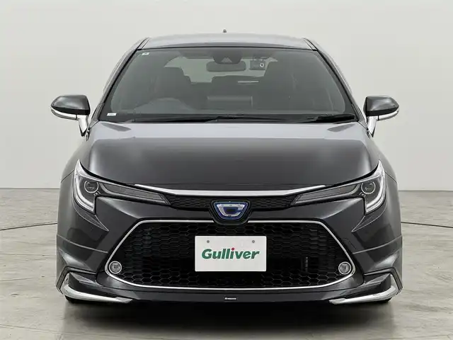 トヨタ カローラツーリング ハイブリッド ダブルバイビー 福岡県 2022(令4)年 4.7万km スパークリングブラックパールクリスタルシャイン モデリスタエアロ　/純正ディスプレイオーディオ　/バックカメラ　/ワイヤレス充電　/ビルトインＥＴＣ　/前後ドラレコ　/レーダークルコン　/トヨタセーフティセンス　/衝突軽減ブレーキ　/レーンキープ　/アクセル踏み間違い防止　/ブラインドスポットモニター　/ハーフレザーシート　/シートヒーター　/ステアリングヒーター　/ＬＥＤヘッドライト　/純正１７インチアルミホイール