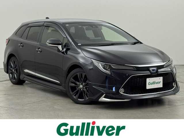 トヨタ カローラツーリング ハイブリッド ダブルバイビー 福岡県 2022(令4)年 4.7万km スパークリングブラックパールクリスタルシャイン モデリスタエアロ　/純正ディスプレイオーディオ　/バックカメラ　/ワイヤレス充電　/ビルトインＥＴＣ　/前後ドラレコ　/レーダークルコン　/トヨタセーフティセンス　/衝突軽減ブレーキ　/レーンキープ　/アクセル踏み間違い防止　/ブラインドスポットモニター　/ハーフレザーシート　/シートヒーター　/ステアリングヒーター　/ＬＥＤヘッドライト　/純正１７インチアルミホイール