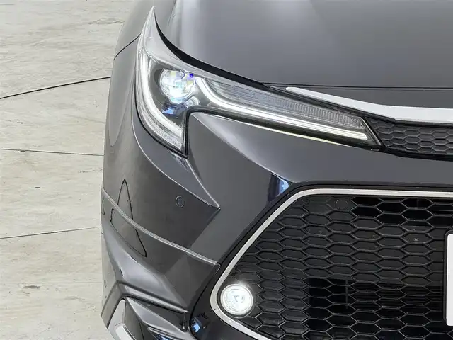 トヨタ カローラツーリング ハイブリッド ダブルバイビー 福岡県 2022(令4)年 4.7万km スパークリングブラックパールクリスタルシャイン モデリスタエアロ　/純正ディスプレイオーディオ　/バックカメラ　/ワイヤレス充電　/ビルトインＥＴＣ　/前後ドラレコ　/レーダークルコン　/トヨタセーフティセンス　/衝突軽減ブレーキ　/レーンキープ　/アクセル踏み間違い防止　/ブラインドスポットモニター　/ハーフレザーシート　/シートヒーター　/ステアリングヒーター　/ＬＥＤヘッドライト　/純正１７インチアルミホイール