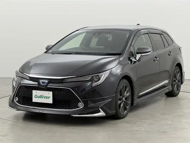 トヨタ カローラツーリング ハイブリッド ダブルバイビー 福岡県 2022(令4)年 4.7万km スパークリングブラックパールクリスタルシャイン モデリスタエアロ　/純正ディスプレイオーディオ　/バックカメラ　/ワイヤレス充電　/ビルトインＥＴＣ　/前後ドラレコ　/レーダークルコン　/トヨタセーフティセンス　/衝突軽減ブレーキ　/レーンキープ　/アクセル踏み間違い防止　/ブラインドスポットモニター　/ハーフレザーシート　/シートヒーター　/ステアリングヒーター　/ＬＥＤヘッドライト　/純正１７インチアルミホイール