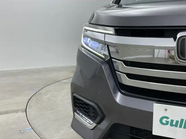 ホンダ ステップワゴン スパーダ eHEV G ホンダS 岡山県 2021(令3)年 4.1万km モダンスティールM 純正９インチナビ　(VXM-217VFNi)/【CD/DVD/USB/SD/フルセグ】/フリップダウンモニター　/両側電動スライド　/レーダークルーズコントロール　/ビルトインＥＴＣ２．０　/ＬＥＤヘッドライト　/バックカメラ　/ドライブレコーダー　/オートハイビーム　/フォグランプ/禁煙車/オートブレーキホールド/純正フロアマット/純正アルミ/アイドリングストップ