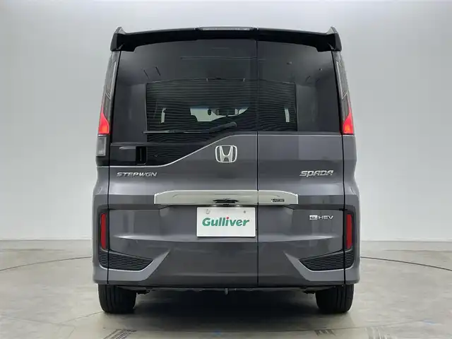 ホンダ ステップワゴン スパーダ eHEV G ホンダS 岡山県 2021(令3)年 4.1万km モダンスティールM 純正９インチナビ　(VXM-217VFNi)/【CD/DVD/USB/SD/フルセグ】/フリップダウンモニター　/両側電動スライド　/レーダークルーズコントロール　/ビルトインＥＴＣ２．０　/ＬＥＤヘッドライト　/バックカメラ　/ドライブレコーダー　/オートハイビーム　/フォグランプ/禁煙車/オートブレーキホールド/純正フロアマット/純正アルミ/アイドリングストップ
