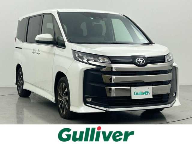 トヨタ ノア S－Z 熊本県 2023(令5)年 3.1万km ホワイトパールクリスタルシャイン 純正10.5インチナビ（CD・ＤＶＤ・フルセグ・ＢＴ・ＡｐｐｌＣａｒＰｌａｙ・ＡｎｄｒｏｉｄＡｕｔｏ・HDMI）/バックカメラ　/純正１４インチフリップダウンモニター　/ビルトインＥＴＣ２．０　/社外前後ドライブレコーダー　/両側パワースライドドア/前後クリアランスソナー/前席シートヒーター/トヨタセーフティーセンス/・レーダークルーズコントロール/・プリクラッシュセーフティ/・プロアクティブドライビングアシスト/・ロードサインアシスト/横滑り防止/ハーフレザーシート/オートライト/オートマチックハイビーム/LEDヘッドライト/フォグライト/スマートキー/プッシュスタート/スペアキー1本