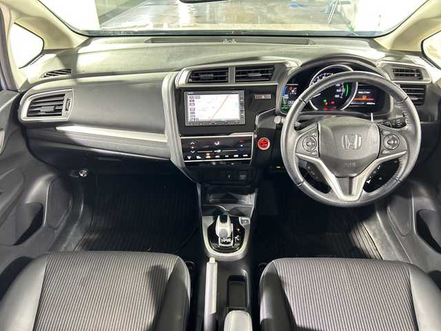 ホンダ フィット ハイブリット L ホンダセンシング 広島県 2019(平31)年 2.7万km モーニングミストブルーM 禁煙車/純正ナビ/（Bluetooth/SD/CD/USB)/バックカメラ/前後ドライブレコーダー/ビルドインETC/レーダークルーズコントロール/オートライト/LEDヘッドライト/フォグランプ/純正フロアマット/ドアバイザー/ハーフレザーシート/チャップアップシート/衝突被害軽減ブレーキ/横滑り防止装置/レーンキープアシスト/スマートキー/電動格納ミラー