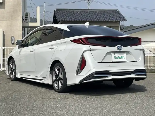 トヨタ プリウス ＰＨＶ A 山口県 2021(令3)年 4.8万km プラチナホワイトパールマイカ モデリスタ エアロ/純正ナビ BT/バックカメラ/ビルトイン ETC/衝突被害軽減ブレーキ/レーダークルーズコントロール/オートマチックハイビーム/ブラインドスポットモニタ/レーンアシスト /パーキングアシスト/コーナーセンサー /運転席パワーシート/前席シートヒーター /ステアリングリモコン/ステアリングヒーター/前後ドラレコ/LEDオートヘッドライト/前後フォグライト /スマートキー/ヘッドアップディスプレイ/W サイド カーテン エアバッグ/AC100V電源/保証書 取説 ナビ取説/禁煙車