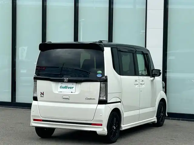 ホンダ Ｎ ＢＯＸ カスタム SSパッケージ 大阪府 2017(平29)年 4.5万km プレミアムホワイトパールⅡ 純正ナビ/   フルセグTV/CD/DVD/Bluetooth/バックモニター/前席シートヒーター/両側パワースライドドア/アイドリングストップ/ステアリングスイッチ/純正フロアマット/ワンオーナー/プッシュスタート/スマートキー/ＥＴＣ/ＬＥＤライト/禁煙車